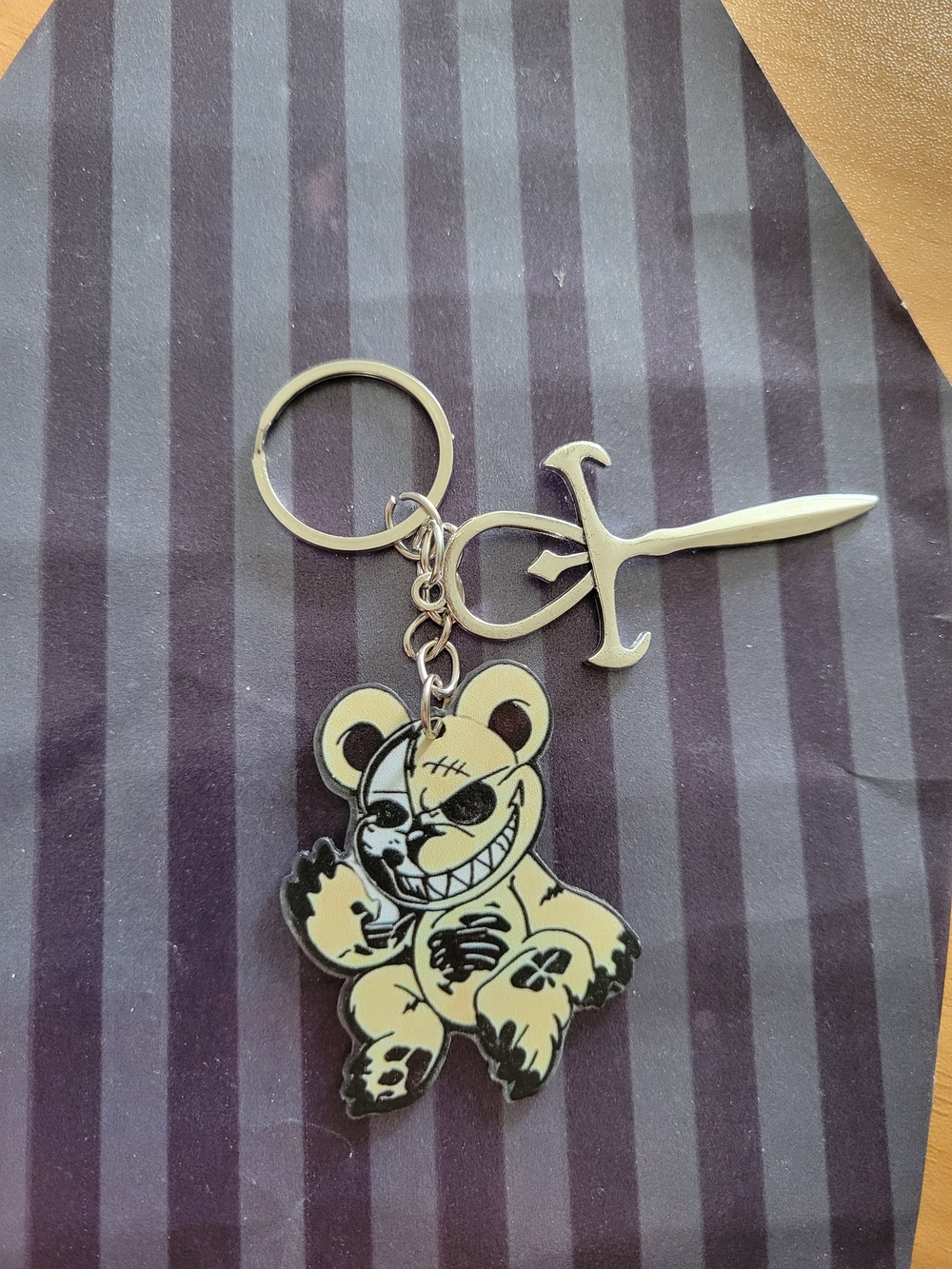 🧋NEW🧋 Hand Crafted yellow and black grinning bear keychain with sword charm